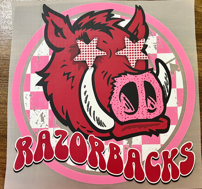 Razorbacks Star eyes hog